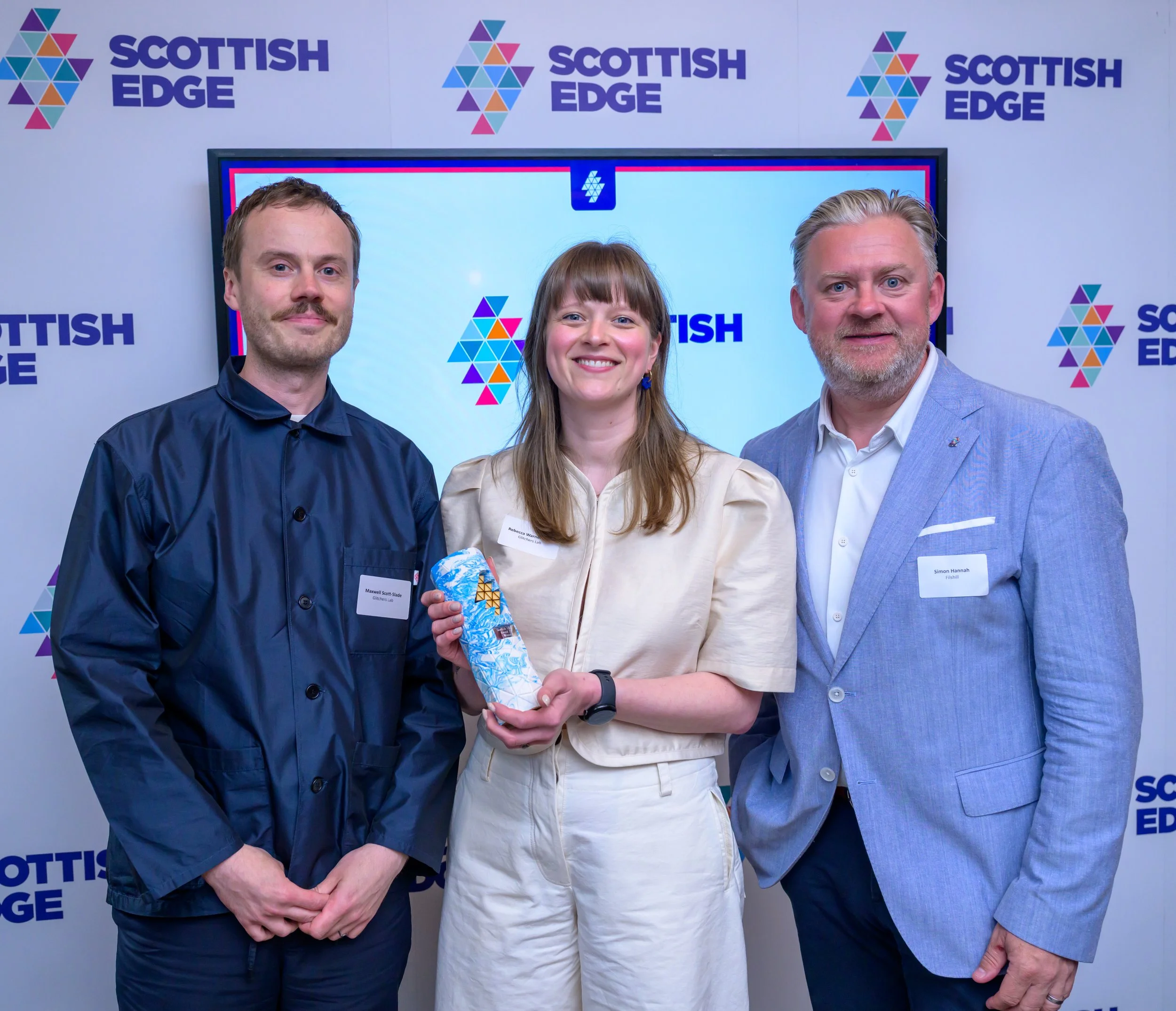 GLITCHERS Lab team celebrating their Scottish EDGE award win.